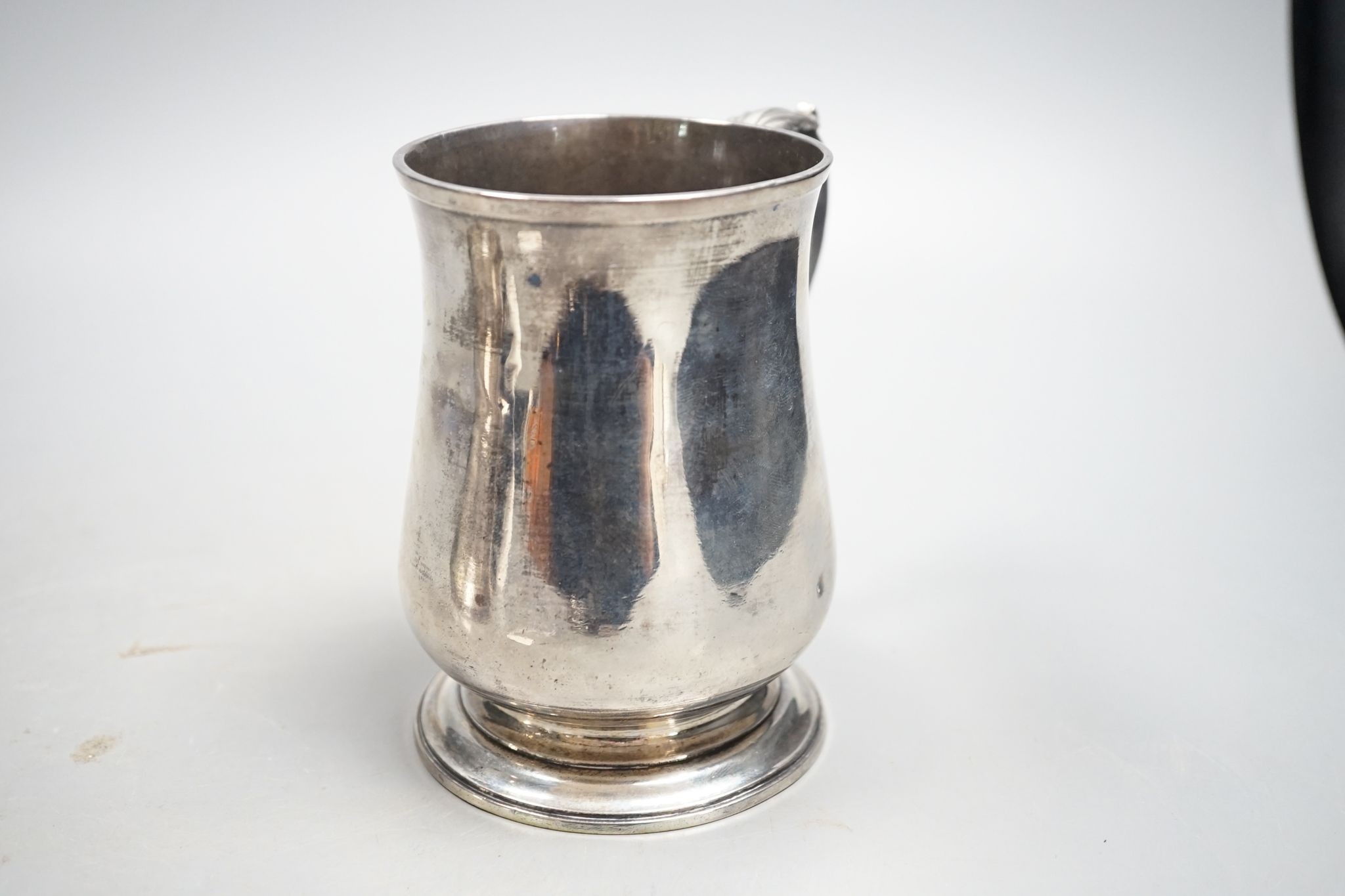 A George III silver baluster mug, Charles Wright, London, 1772, 13cm, 13.5oz.